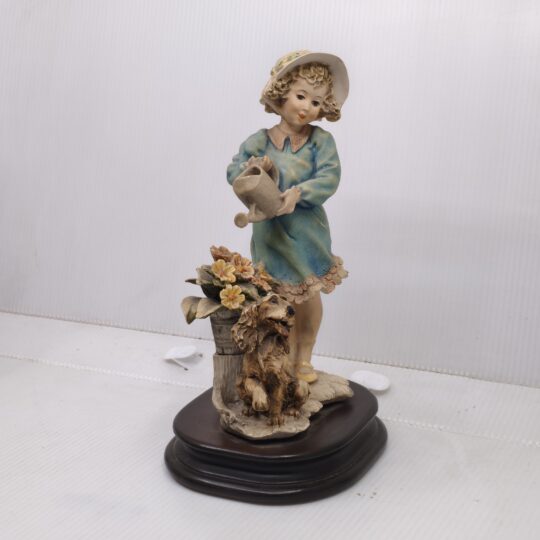 Nurturing Moments: Handcrafted Scene of Girl, Pup & Garden Blooms