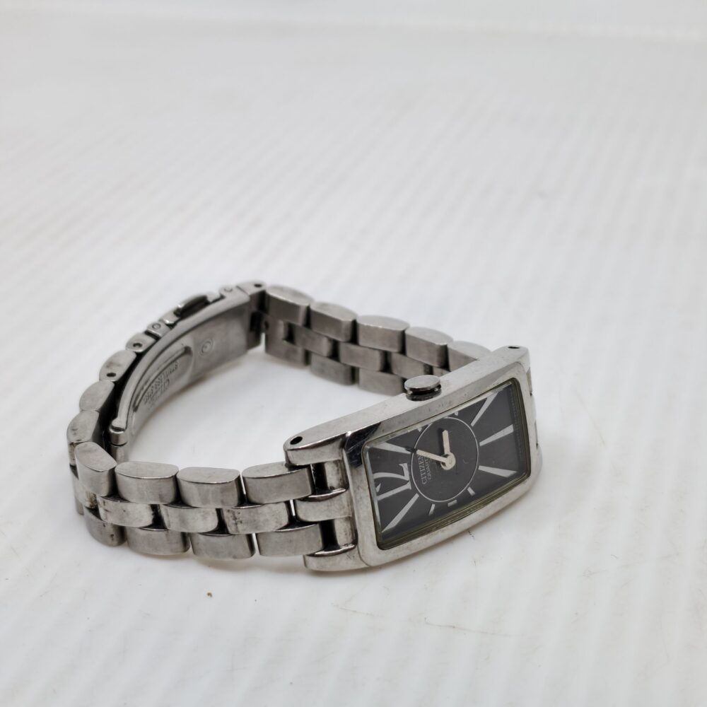 Emporio Armani rectangular watch | Black dial dress watch | Roman numeral men’s timepiece | Silver bracelet Armani wristwatch