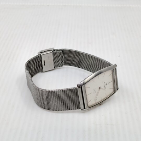 Titan Edge ultra-thin watch | Minimalist rectangular dial | Stainless steel mesh strap | Slim Titan men’s wristwatch
