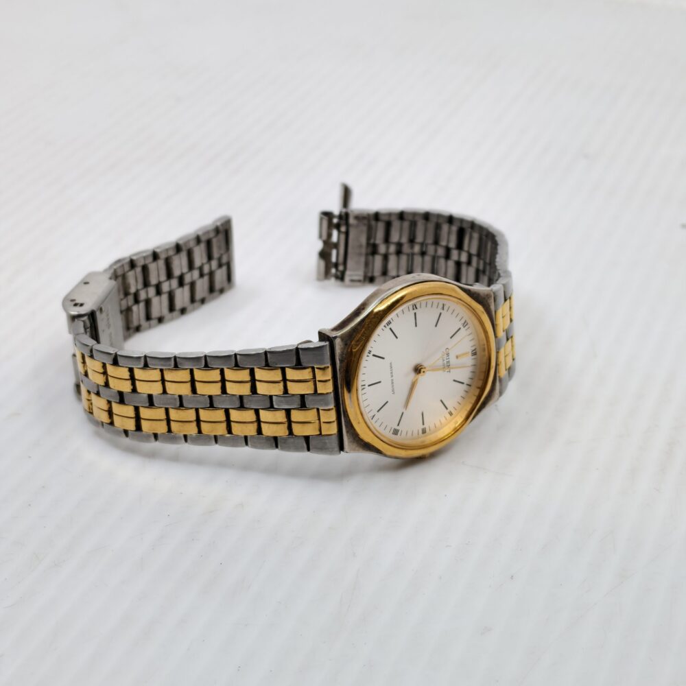 Orient “Imperial Crest” Quartz Dress Watch – Two-Tone Stainless Steel with Gold Bezel 2 Orient two-tone quartz watch | Gold bezel dress watch | White dial men’s wristwatch | Elegant water-resistant timepiece