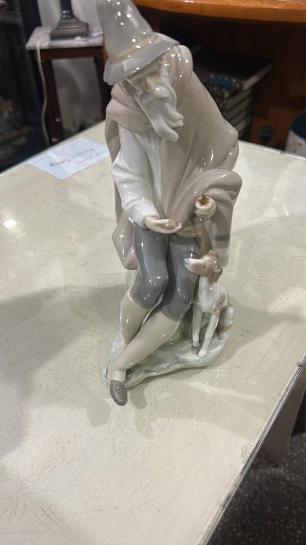 Lladró “Whispers of Companionship” – Porcelain Figurine of Elder & Dog 1 Lladró “Whispers of Companionship” – Porcelain Figurine of Elder & Dog