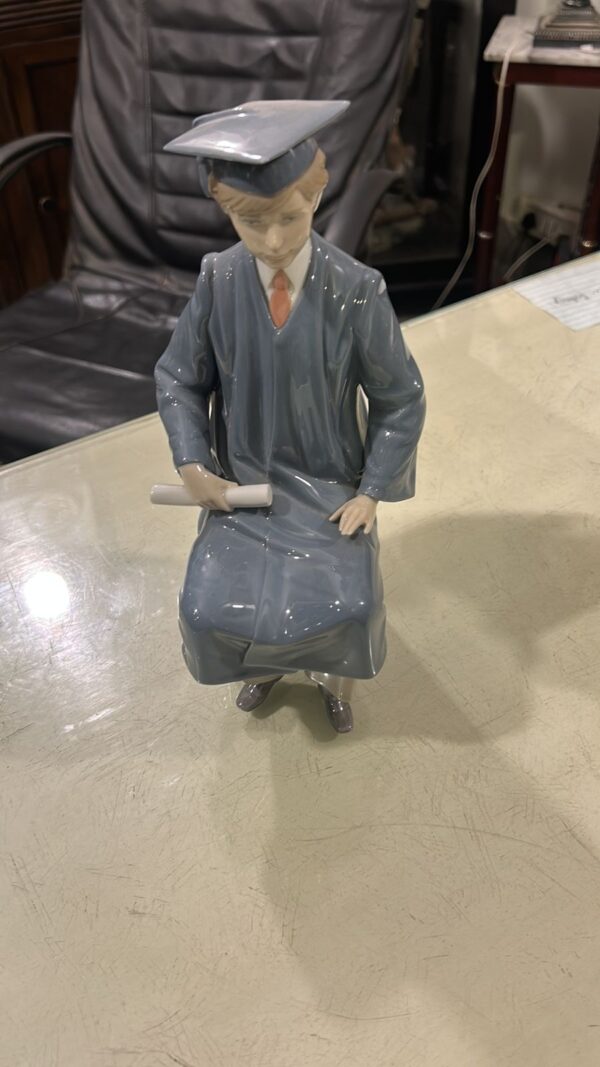 Lladró graduation figurine | Porcelain graduate sculpture | Academic milestone collectible | Spanish handcrafted ceramic art